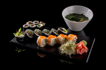 sushi lunch set isolated on the black background