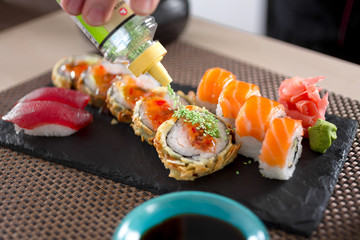 preparing sushi in Japanese restaurant