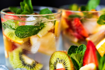 Homemade lemonade with fruit and mint