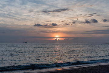Beautiful sunset on the Big Island of Hawaii, colors are enhanced by all the volcanic particles in the air 