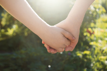 children holding hands, friendship