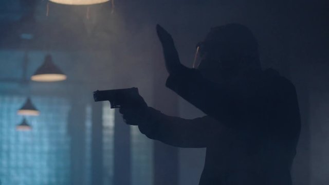 People in gas masks and with weapons. Terrorist and terrorism