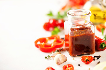 Homemade sauce adjika with pepper, garlic, tomatoes and parsley. Selective focus. Copy space
