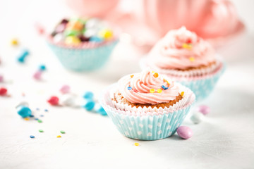 Strawberry cupcakes with color candies