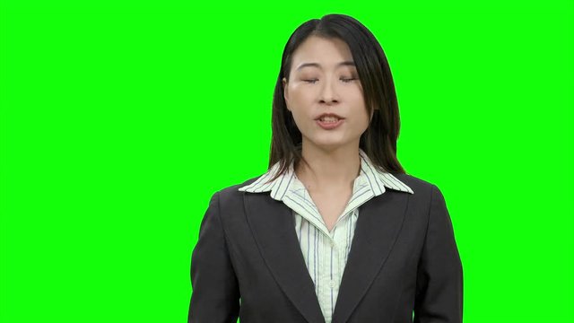 Asian Female Anchor Woman On Green Screen