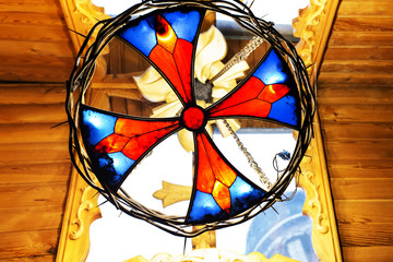 multicolored stained glass window in the sun