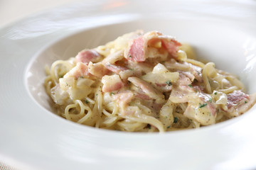 Spaghetti carbonara white sauce with bacon and cheese
