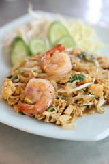 Shrimp pad thai noodles with shrimps on top , Thai food