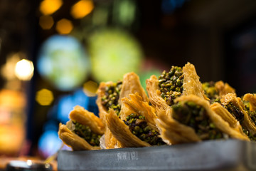 Traditional oriental dessert baklava with pistachios and walnuts