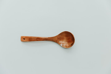 Kitchen utensils on pastel background