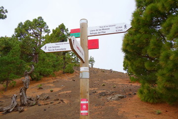 Signpost of a hiking trail GR131 Ruta de los Volcanes leading from Fuencaliente to Tazacorte on La Palma, Canary Islands, Spain