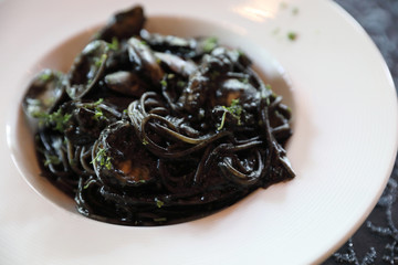 Spaghetti seafood with squid ink , Italian food