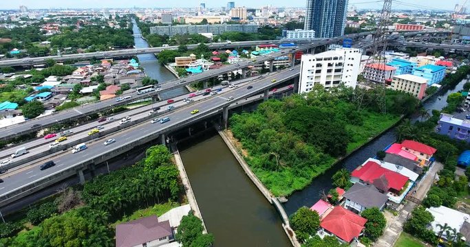 Bangkok City Ascending Drone Shot Over Canal and Skyscrapers