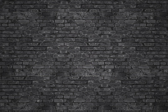 Vintage Black wash brick wall texture for design. Panoramic background for your text or image