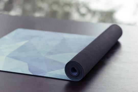 Top View Of Pilled Yoga Mat On The Floor, Close Up, No People, Yoga Concept