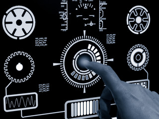 close up of hand pushing botton on futuristic user interface concept. Head up Display(HUD)