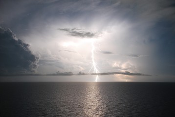 Stunning lightning, thunderstorm on the sea, Bermuda triangle