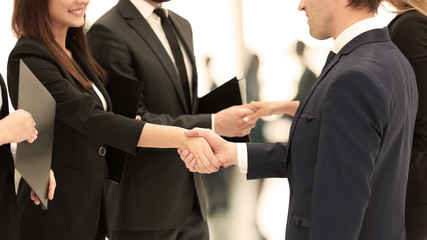 concept of cooperation.handshakes when meeting business partners