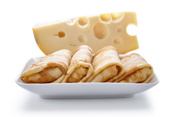 pancakes with cheese are isolated on a white background