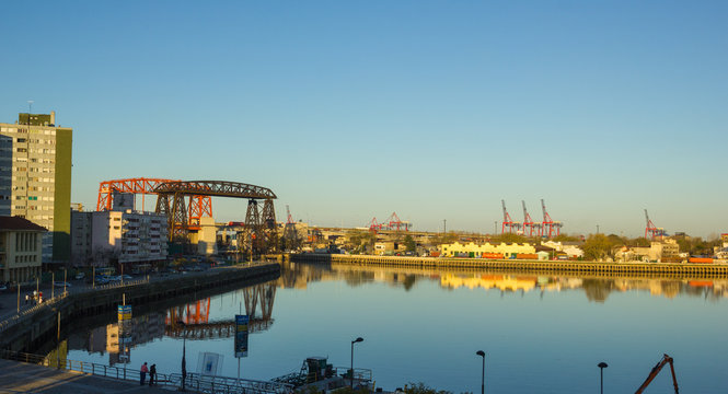 Panorama of the industrial part of La Boca, with cranes of the port and the bridge of Avellaneda in the background. Buenos Aires, Argentina