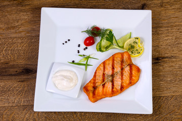 Grilled salmon with sauce