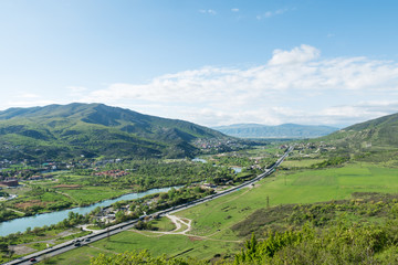 Fototapeta na wymiar Mountainous Georgia, road through the valley of the Aragvi River to the city of Mtskheta.