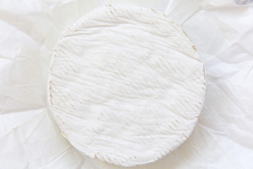 Camembert cheese. Flatlay, closeup. Top view.