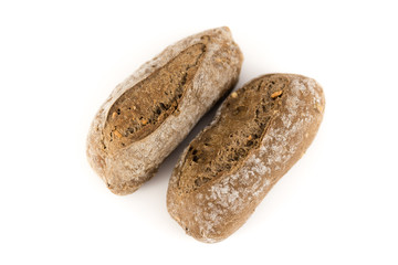 bread with cereals and nuts on white background