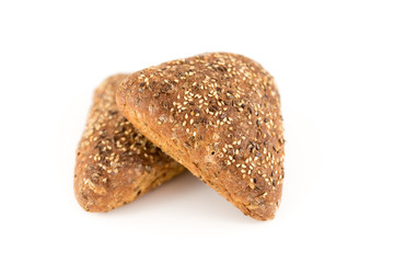 bread with cereals and nuts on white background