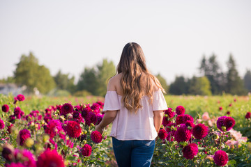 Teen Walking In A Field Of Flowers 
