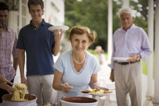 View of a family gathered for a buffet.