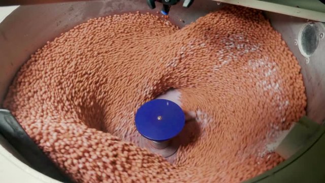 Process of treatment of soybean seeds against disease and insects. Slow motion. HD