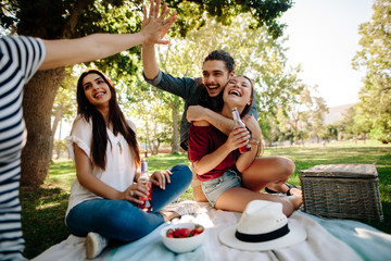 Friends having fun on picnic