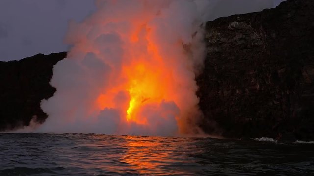 Lava from the Kīlauea volcano flows into the ocean on the Big Island of Hawaii