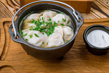 Dumplings with sour cream and herbs