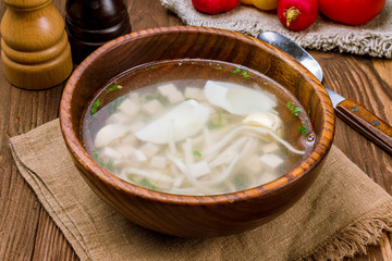 Chicken soup bouillon in a plate