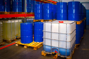 Barrels of chemicals. Chemistry. Metal barrels for chemical products.