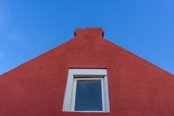 Colorful building against blue sky in Oranjestad