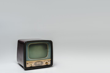 retro tv with blank screen on grey surface