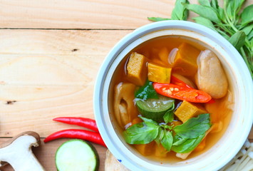 Thai spicy mixed vegetables soup with mushrooms