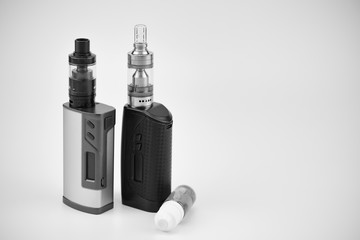E - cigarette for vaping , technical devices.The liquid in the bottle 