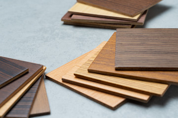 samples of material, wood , on concrete table.Interior design select material for idea.