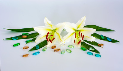 flowers lilies adorned with stones and different decorations. 