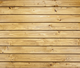 Fototapeta premium Wooden wall with horizontal planks. Close up of an old wooden fence panels.