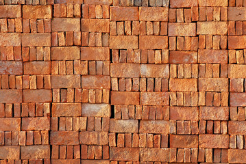 Red Brown brick block texture is stack for Construction - abstract background 
