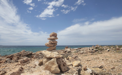 Stone balancing in the south coast of the Spanish island of Mallorca.