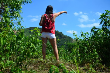 Young woman is hiking in the nature of the Philippines.