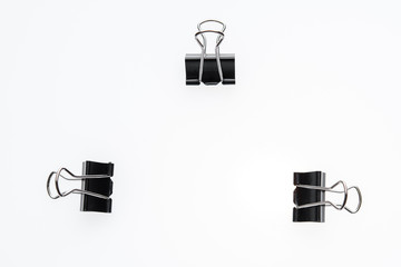 Binder clips for paper on a white background