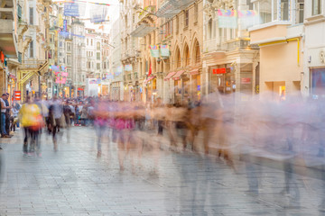 People walk at Istiklal street in Istanbul