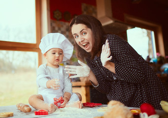 The mother and son playing with flour